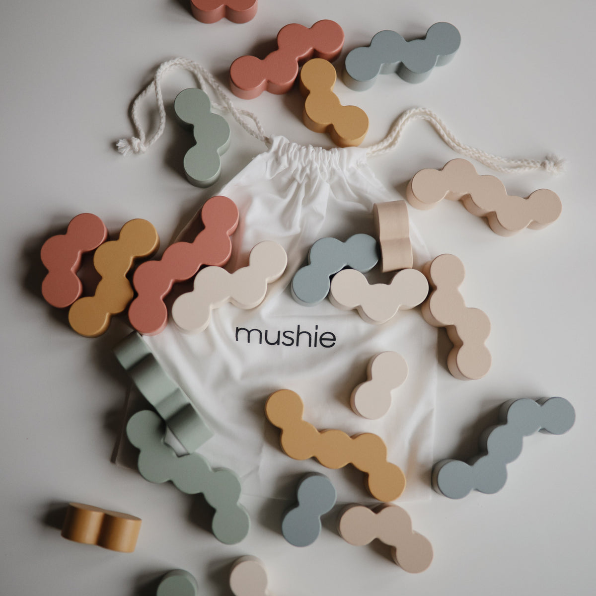 Mushie Wooden Balance Blocks laid out