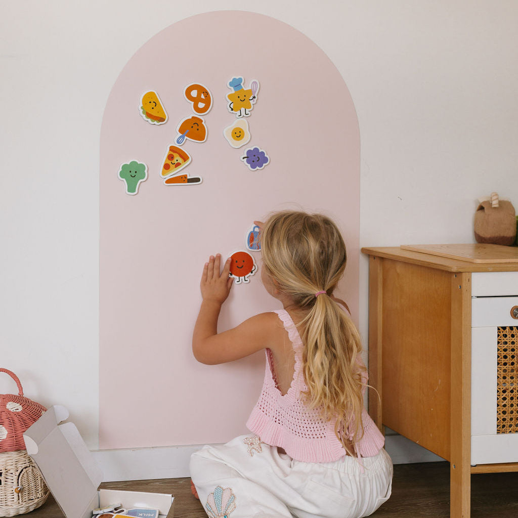 Child playing with Smartypals Little Chef magnets