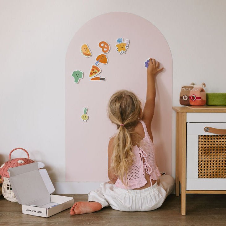 Smartypals food magnets on a play wall