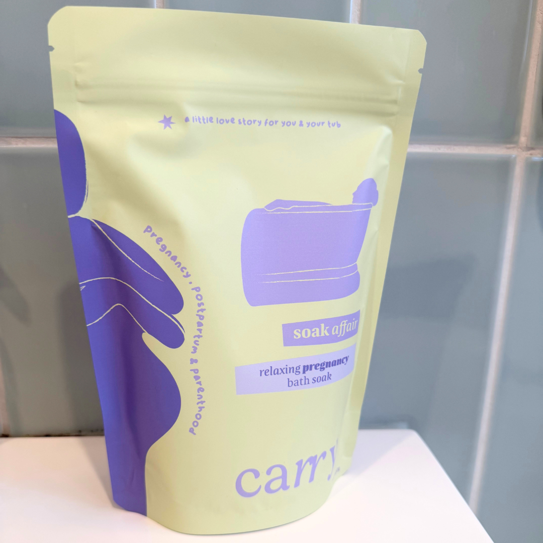 Carry Soak Affair pregnancy bath soak pouch on a bathroom shelf