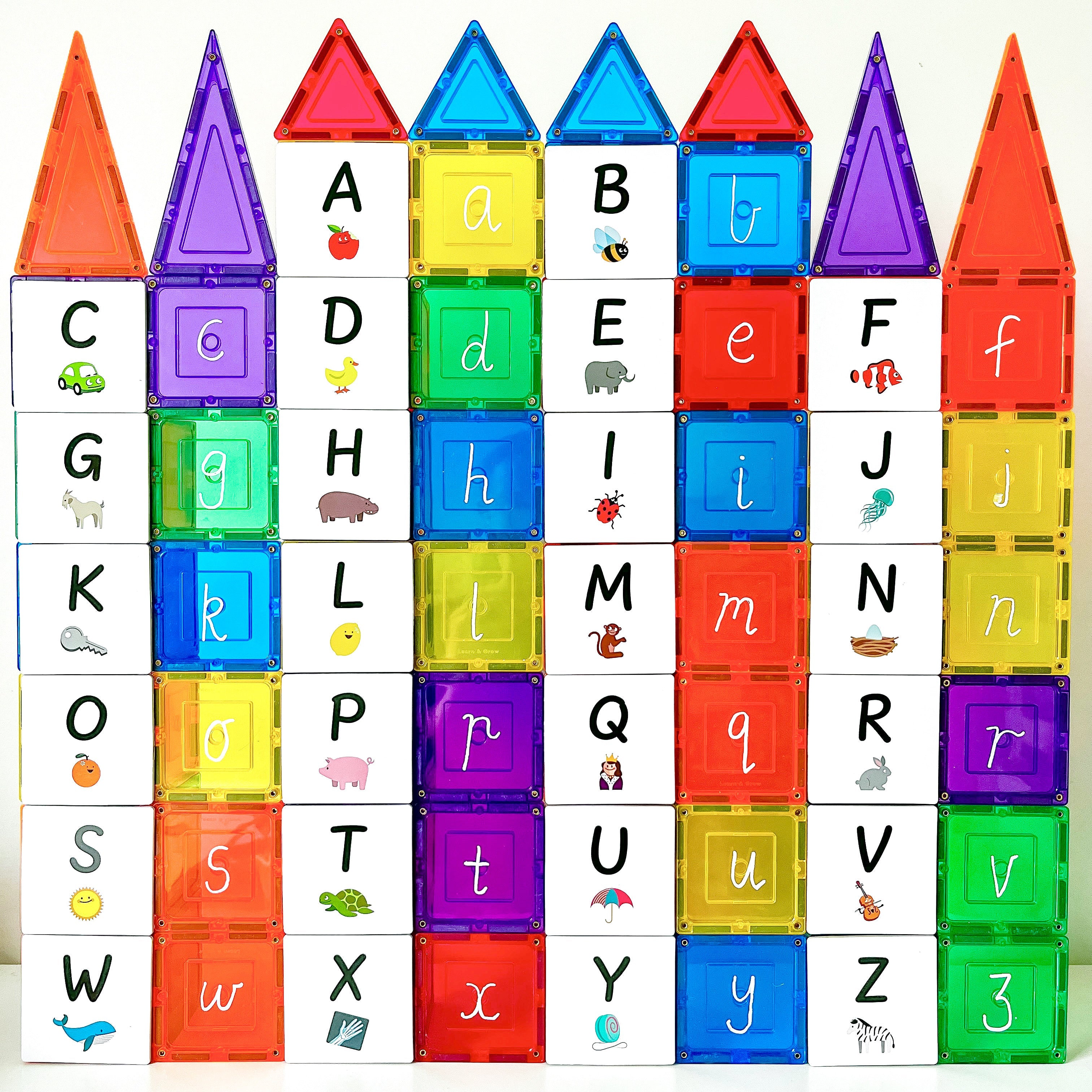 Upper case letters spelled with the alphabet toppers on magnetic tiles