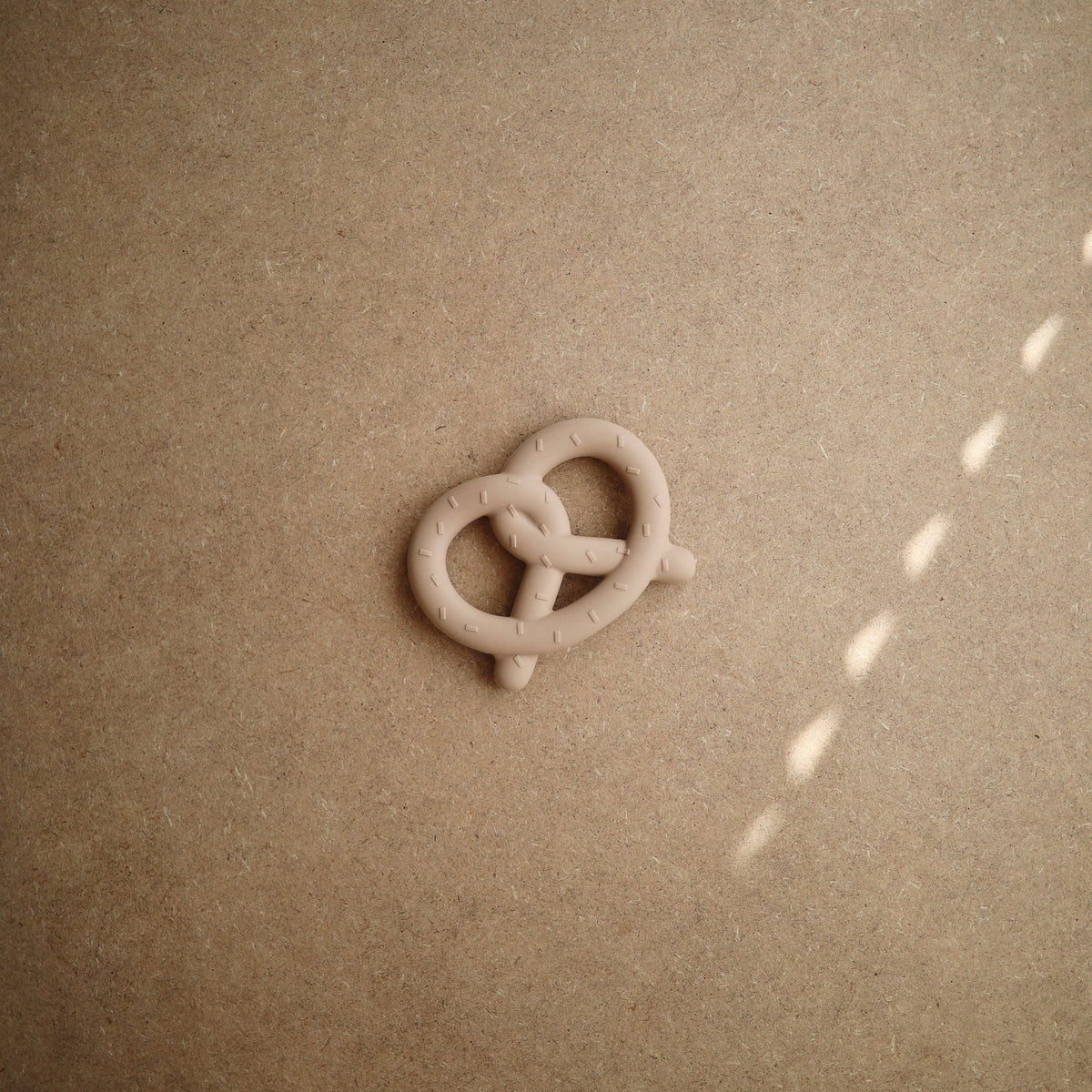 Mushie Pretzel Teether detail