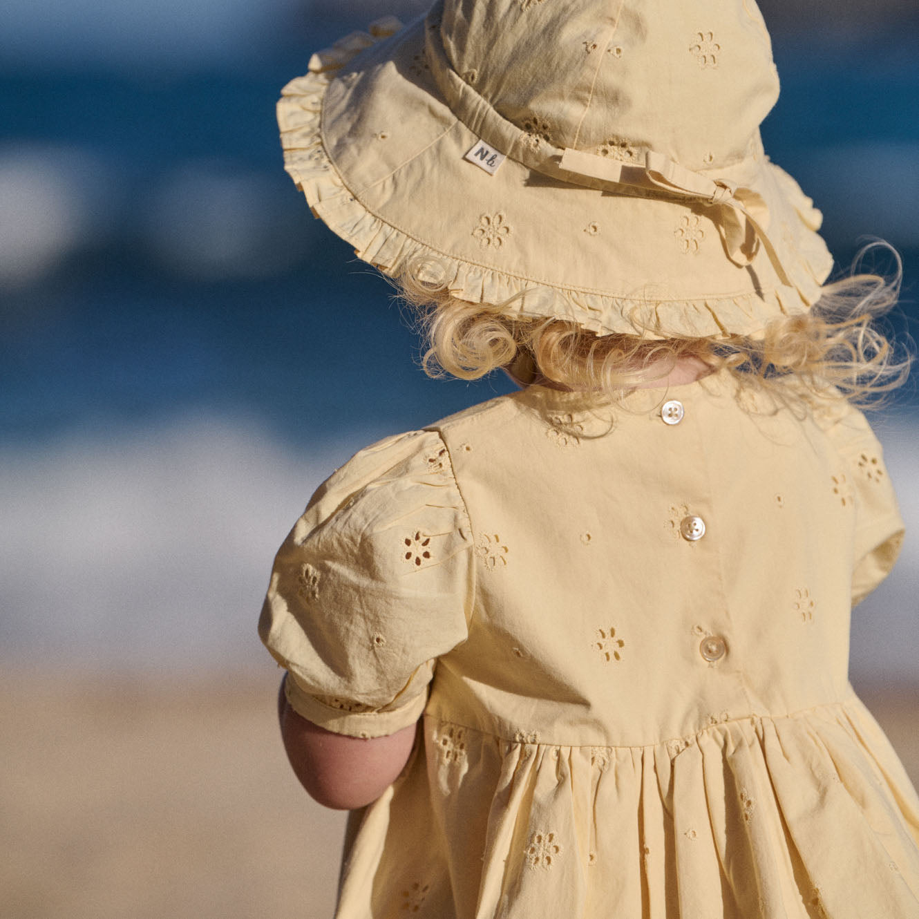 Annabelle Sunhat in Buttercup, worn