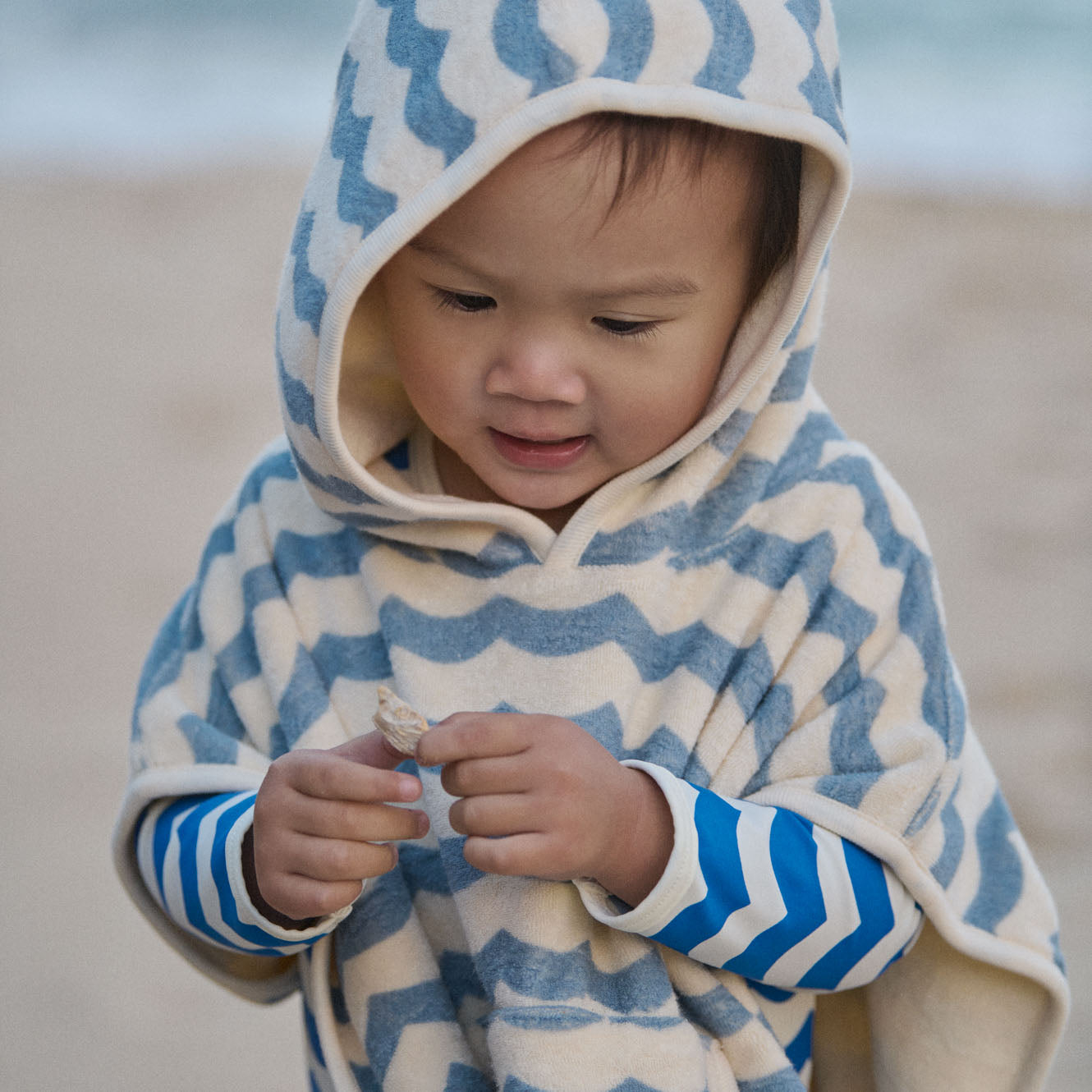 Poncho Towel in Waves Print, in use