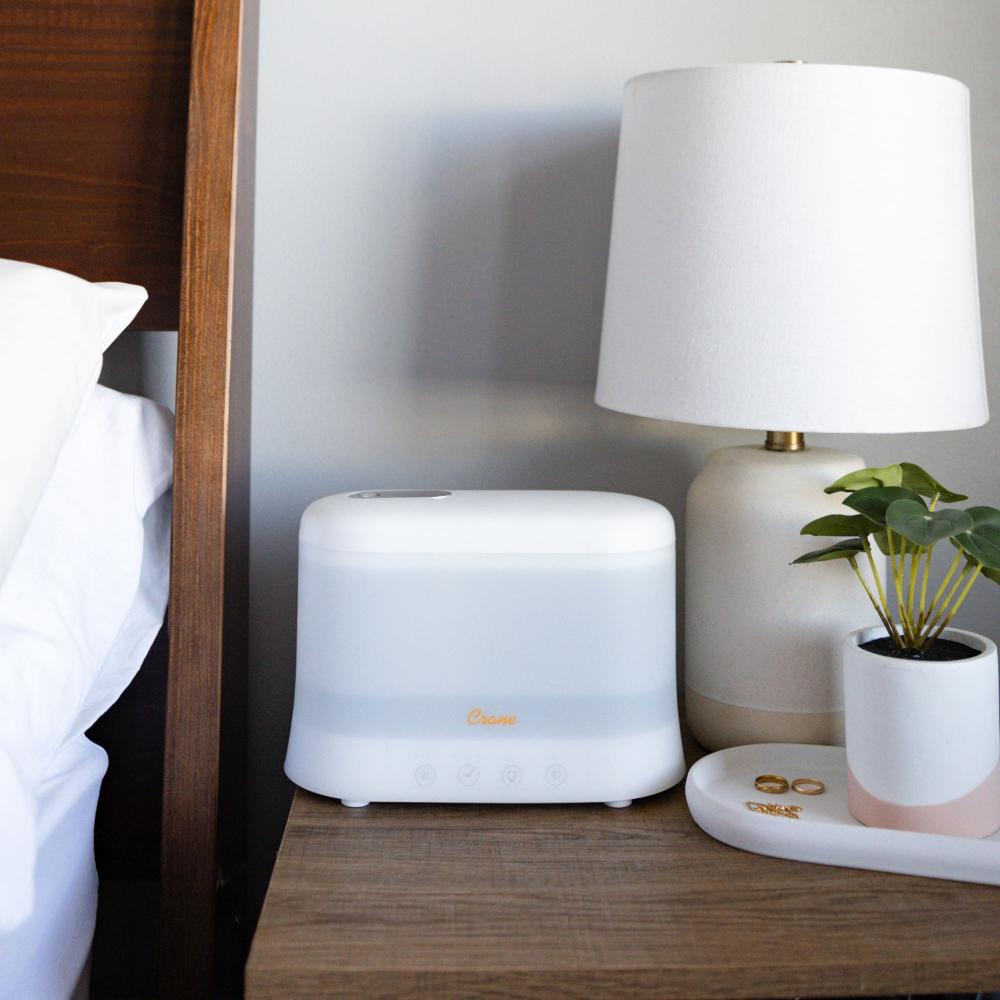 Crane Top Fill Humidifier in use in a bedroom
