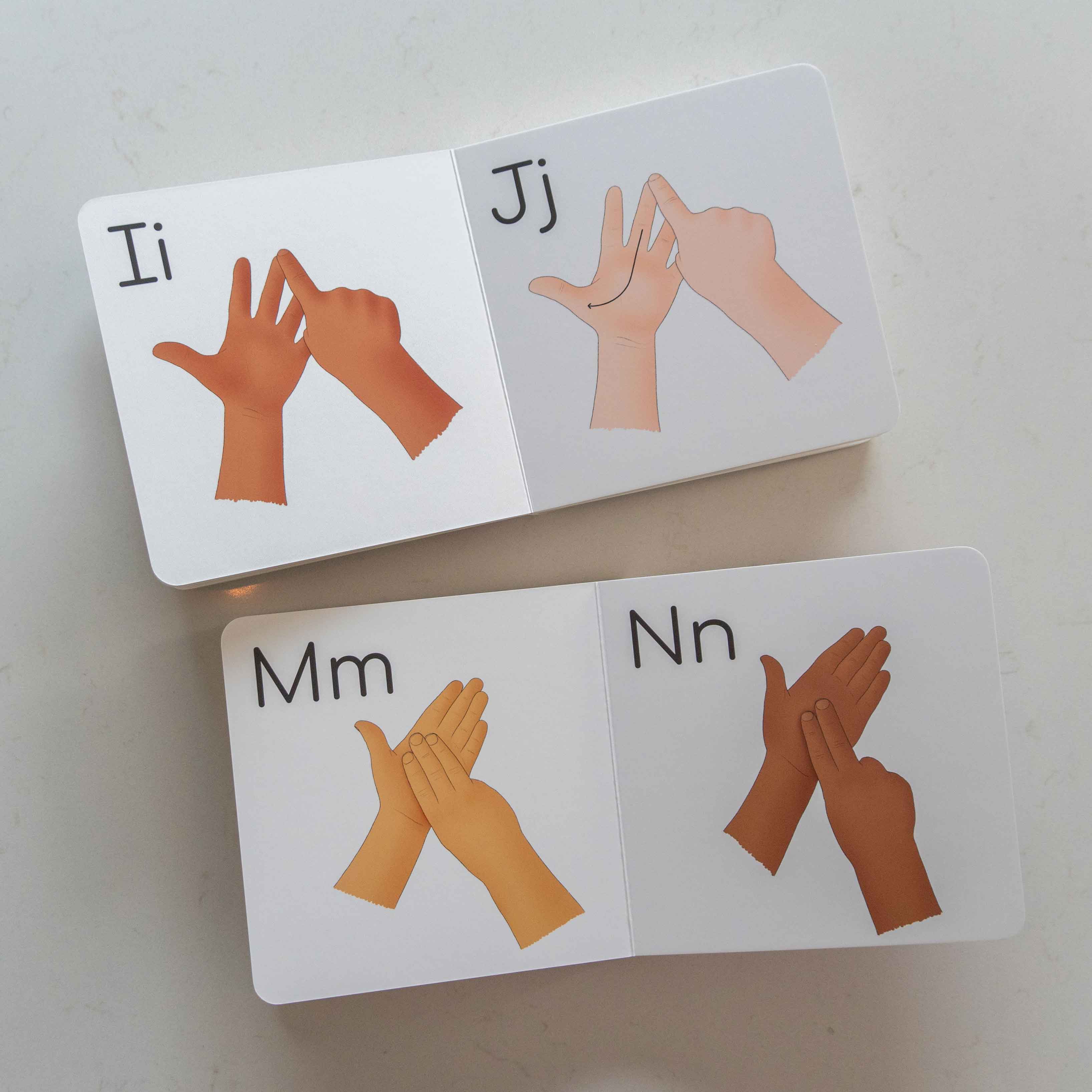 First signs finger spelling board book
