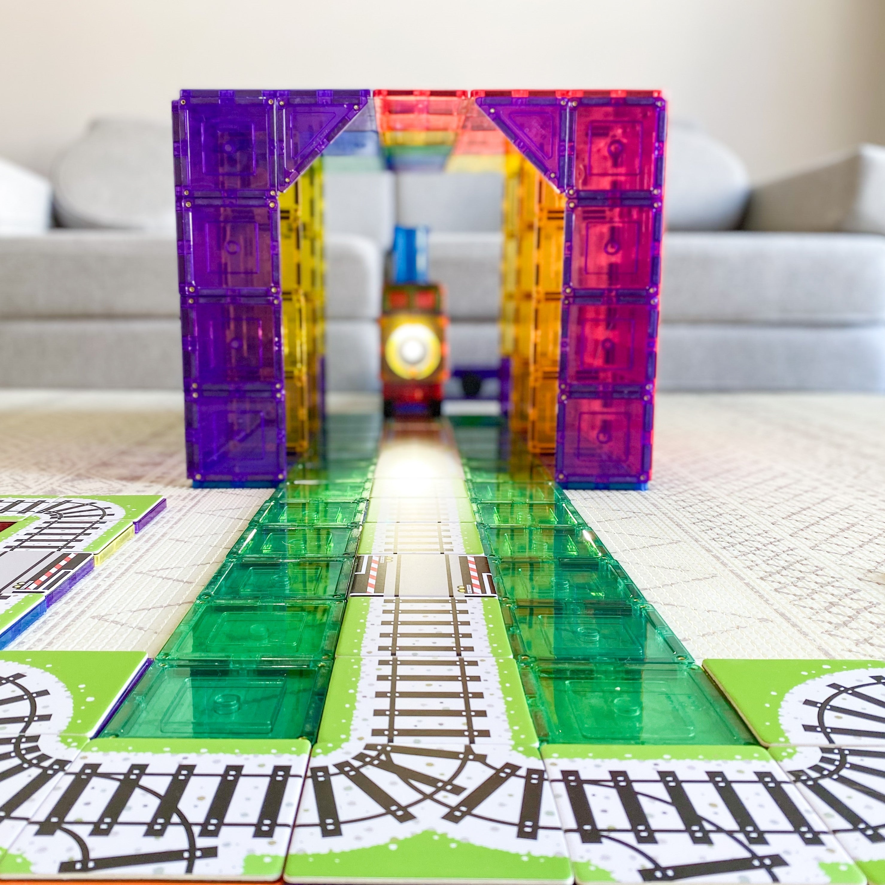 Magnetic tile train on a track built with the Train Pack toppers