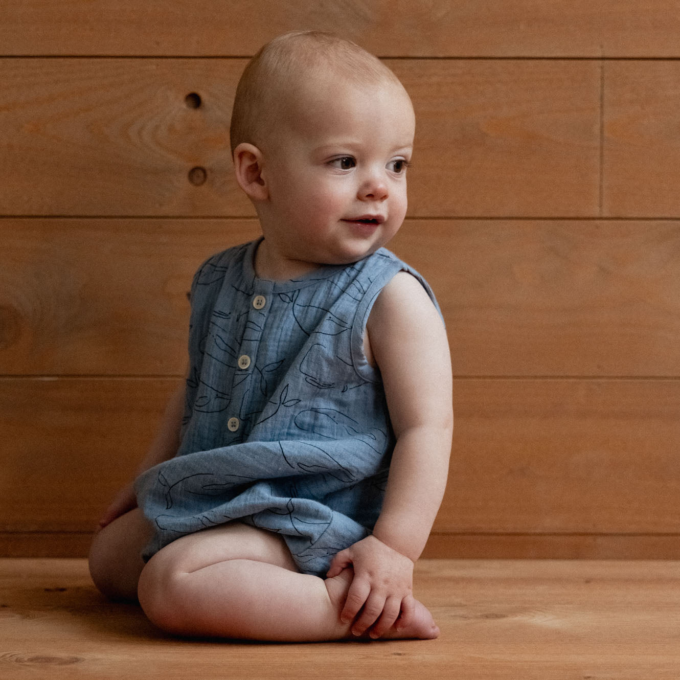 Nature baby blue whale cedar muslin suit
