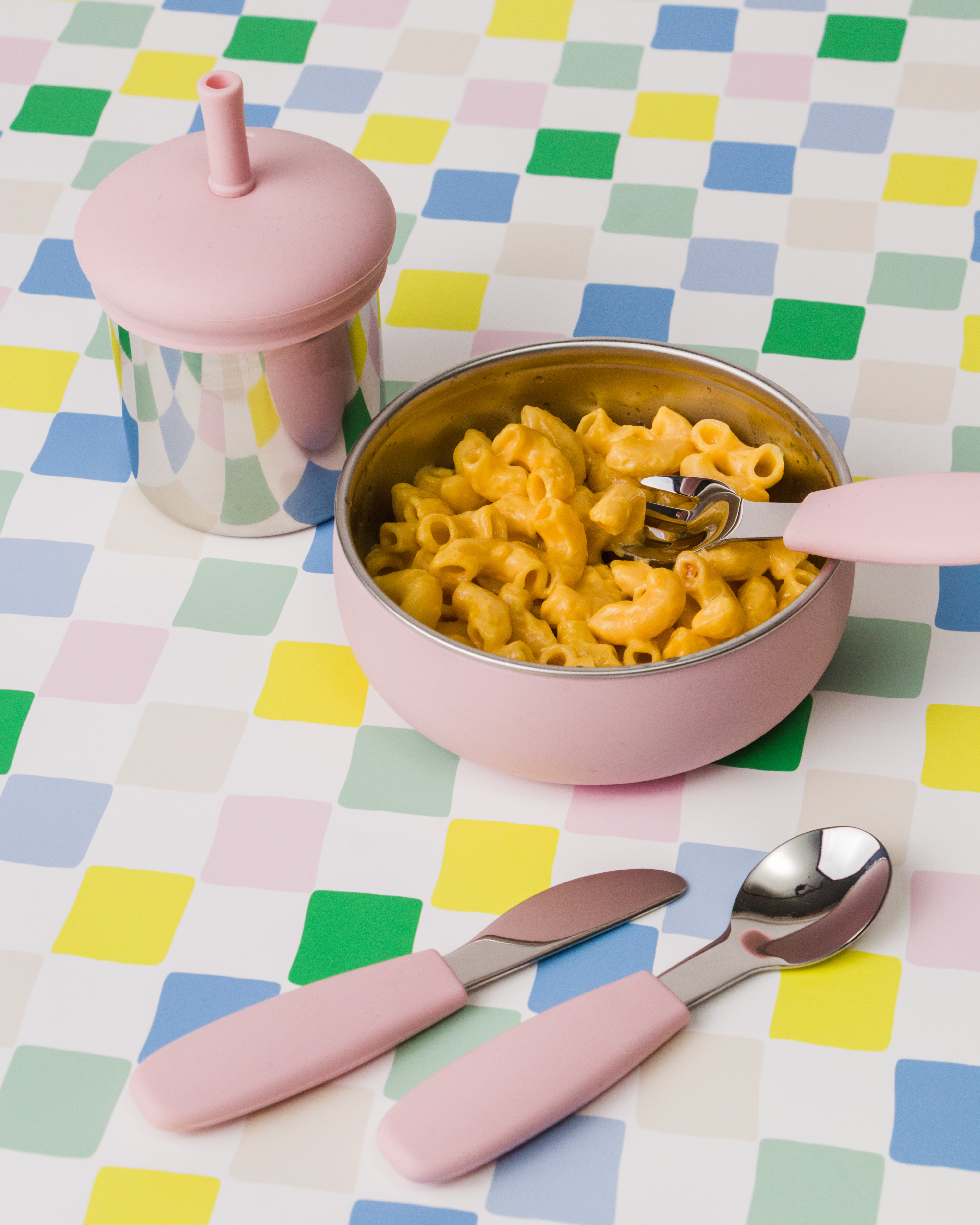 nestling stainless steel dinnerware in dusty pink