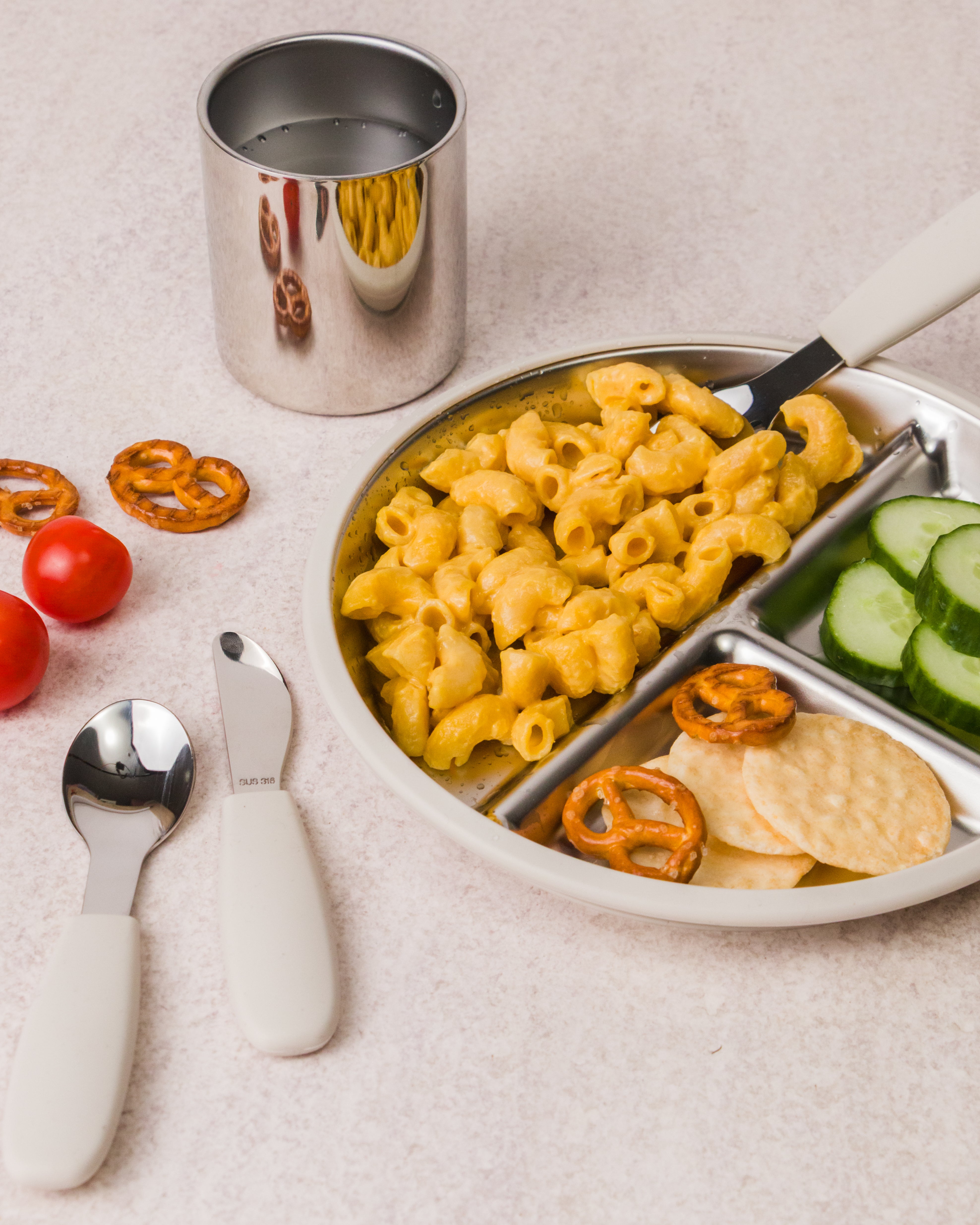 nestling stainless steel dinnerware in oat