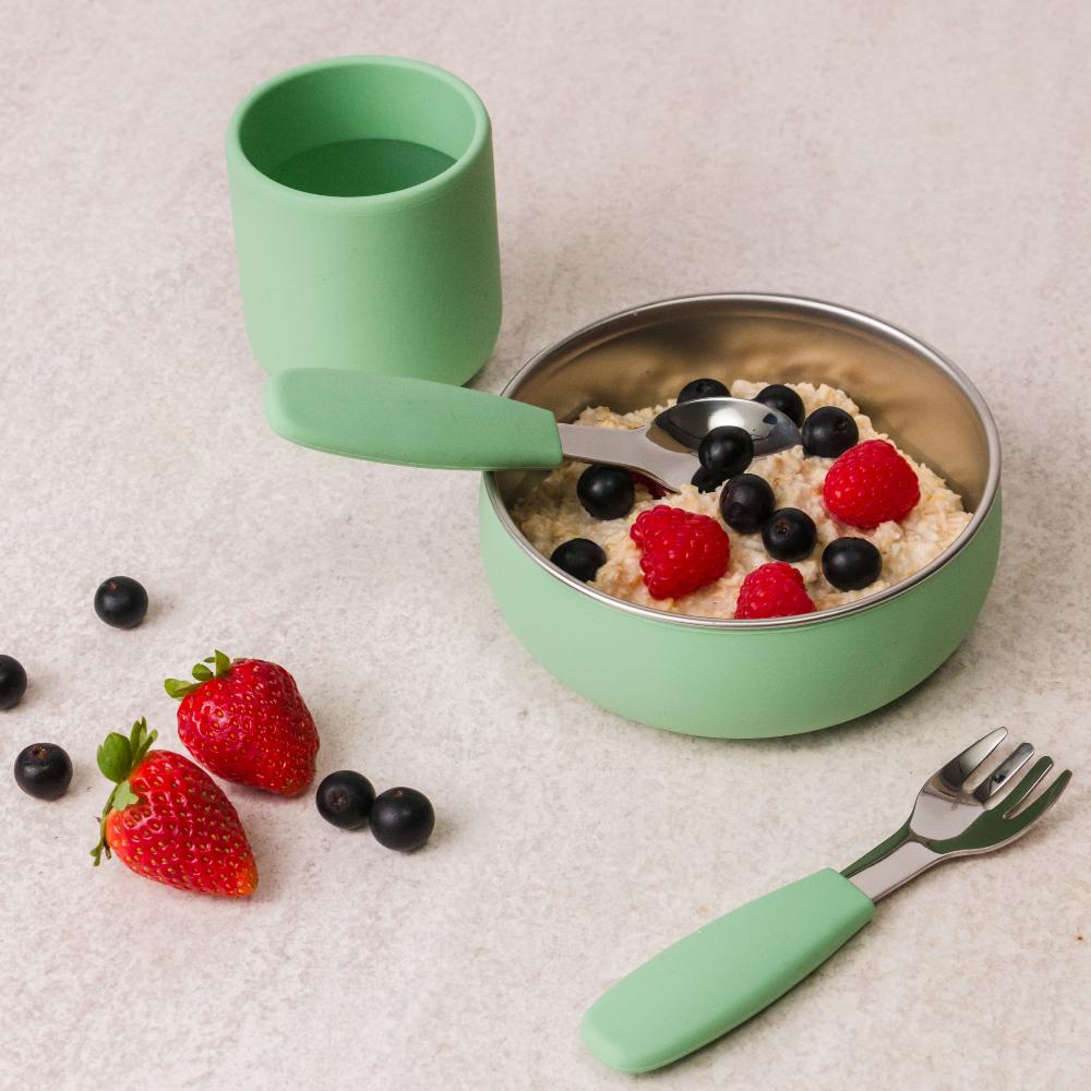 nestling stainless steel dinnerware in sage