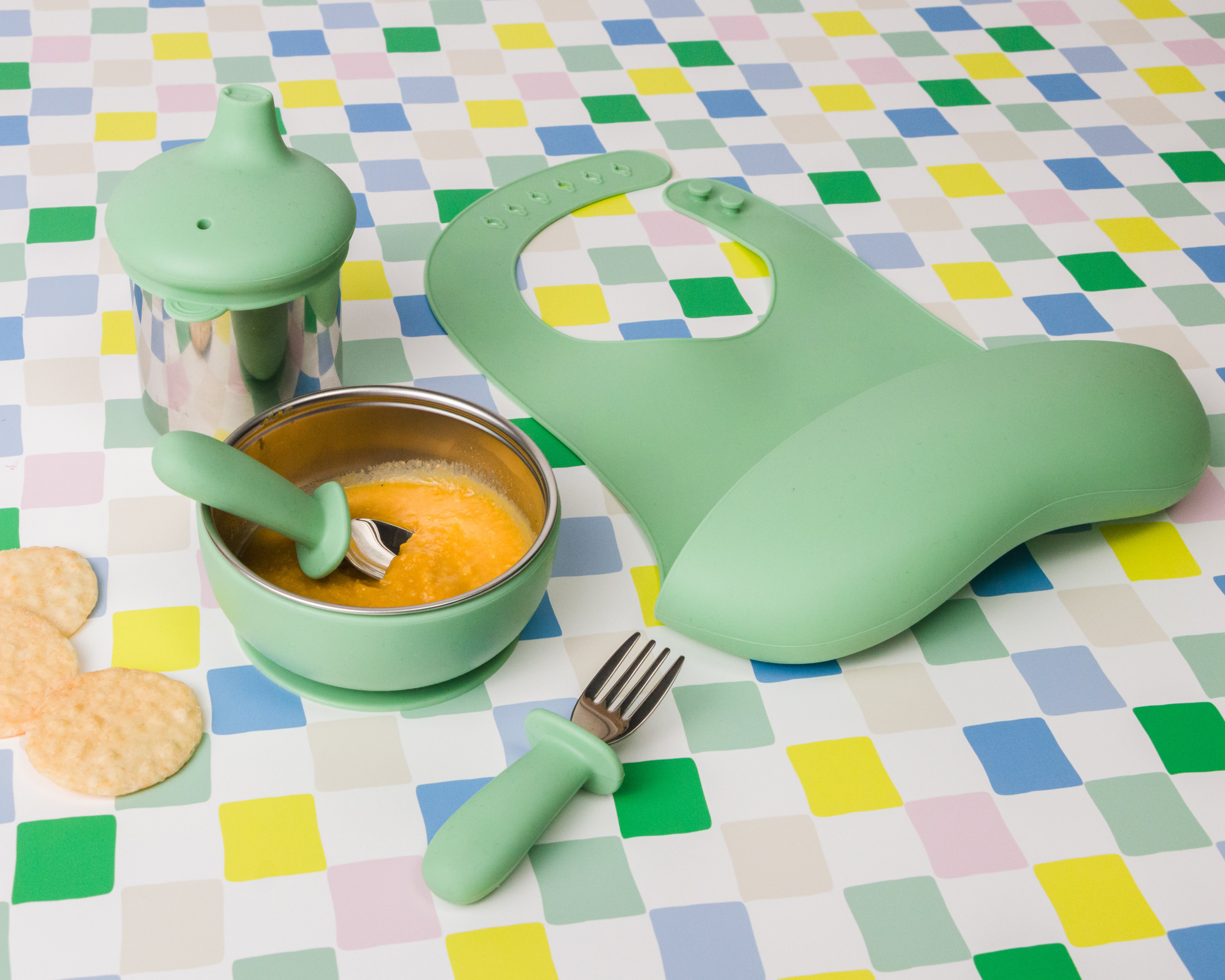 nestling stainless steel dinnerware in sage