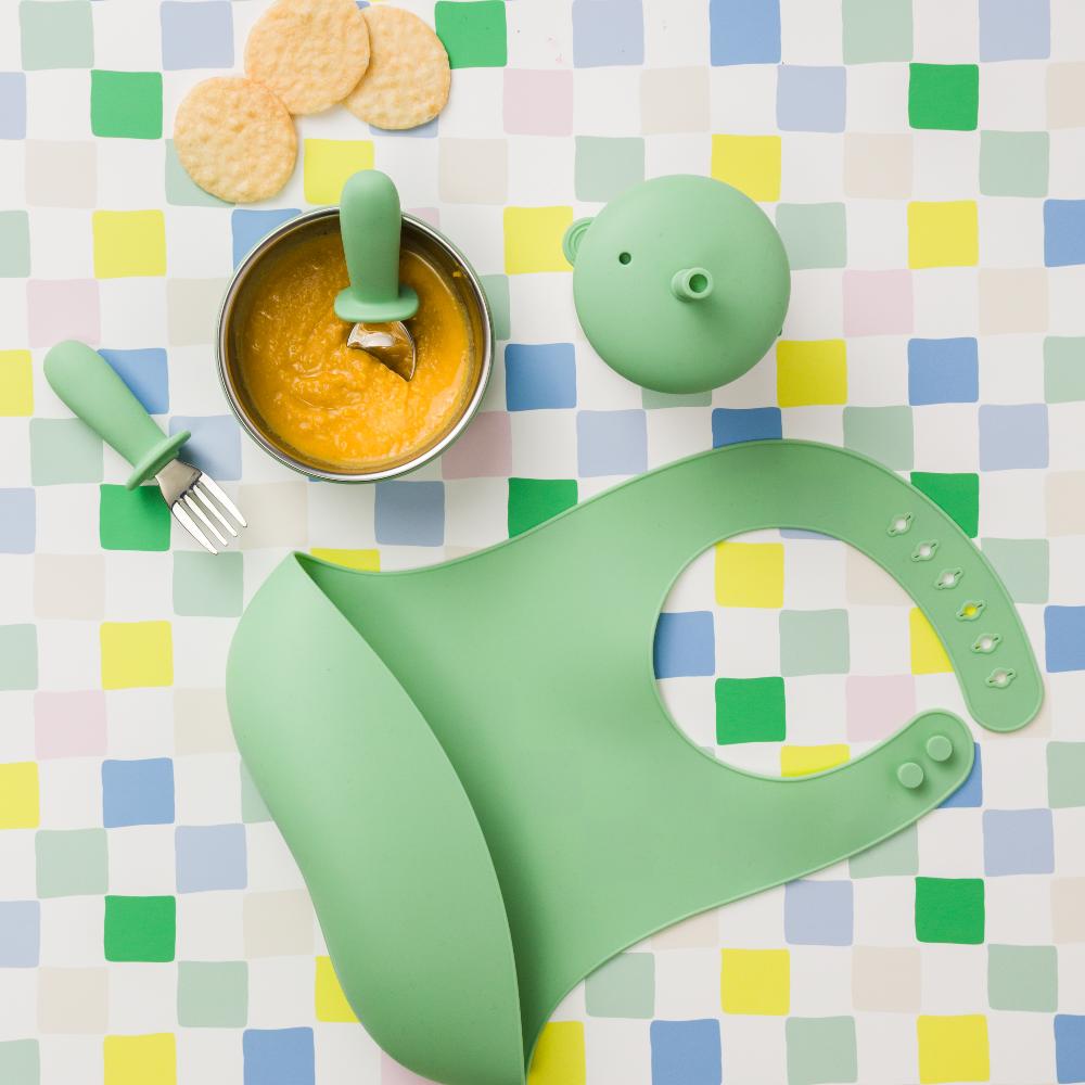 nestling silicone bib in sage