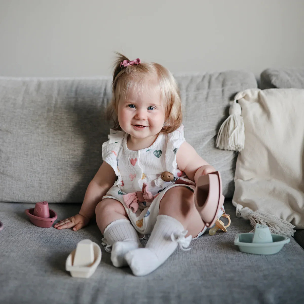 mushie bath boats petal