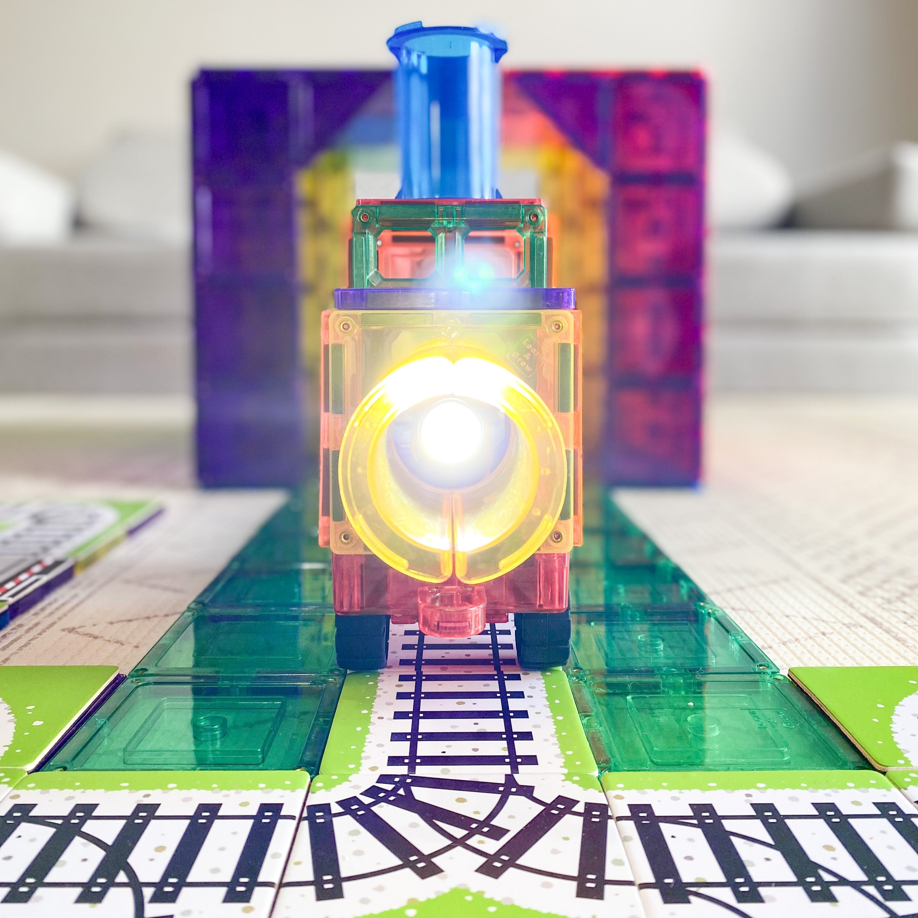 Magnetic tile train and track built with the Train Pack toppers