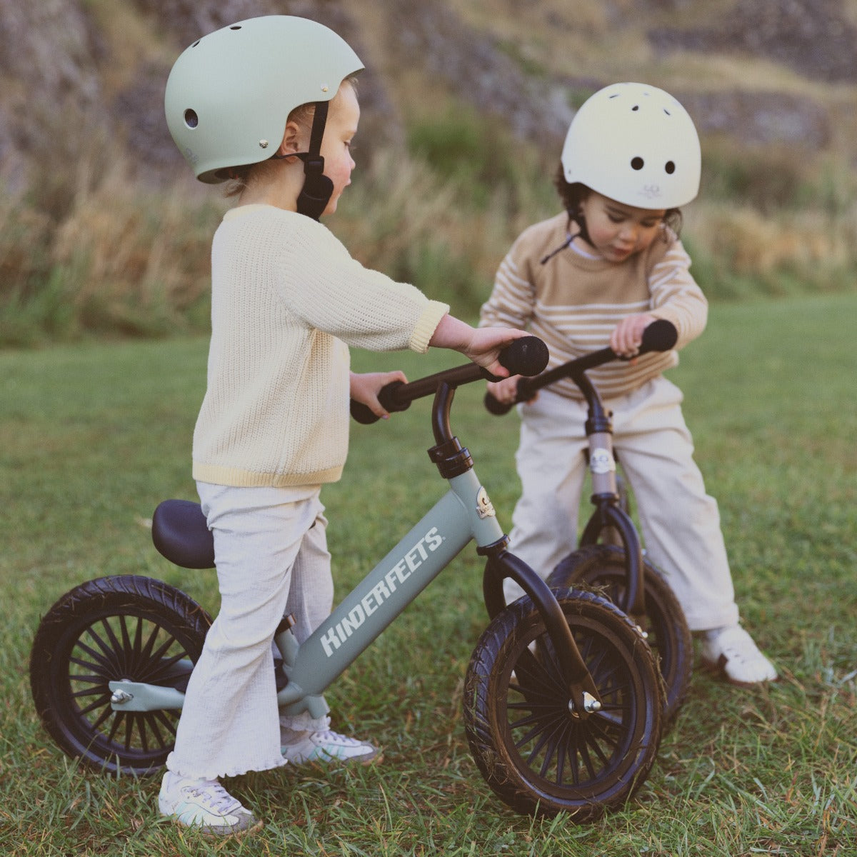 Toddlers riding Kinderfeets Trail Bikes