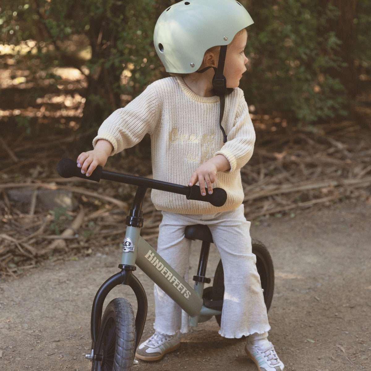 Toddler on the Kinderfeets Trail Bike in Silver Sage