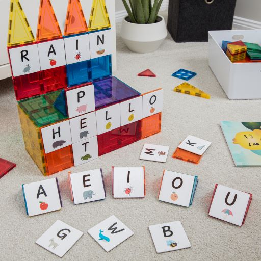 Child playing with the Alphabet Upper Case Pack letter toppers