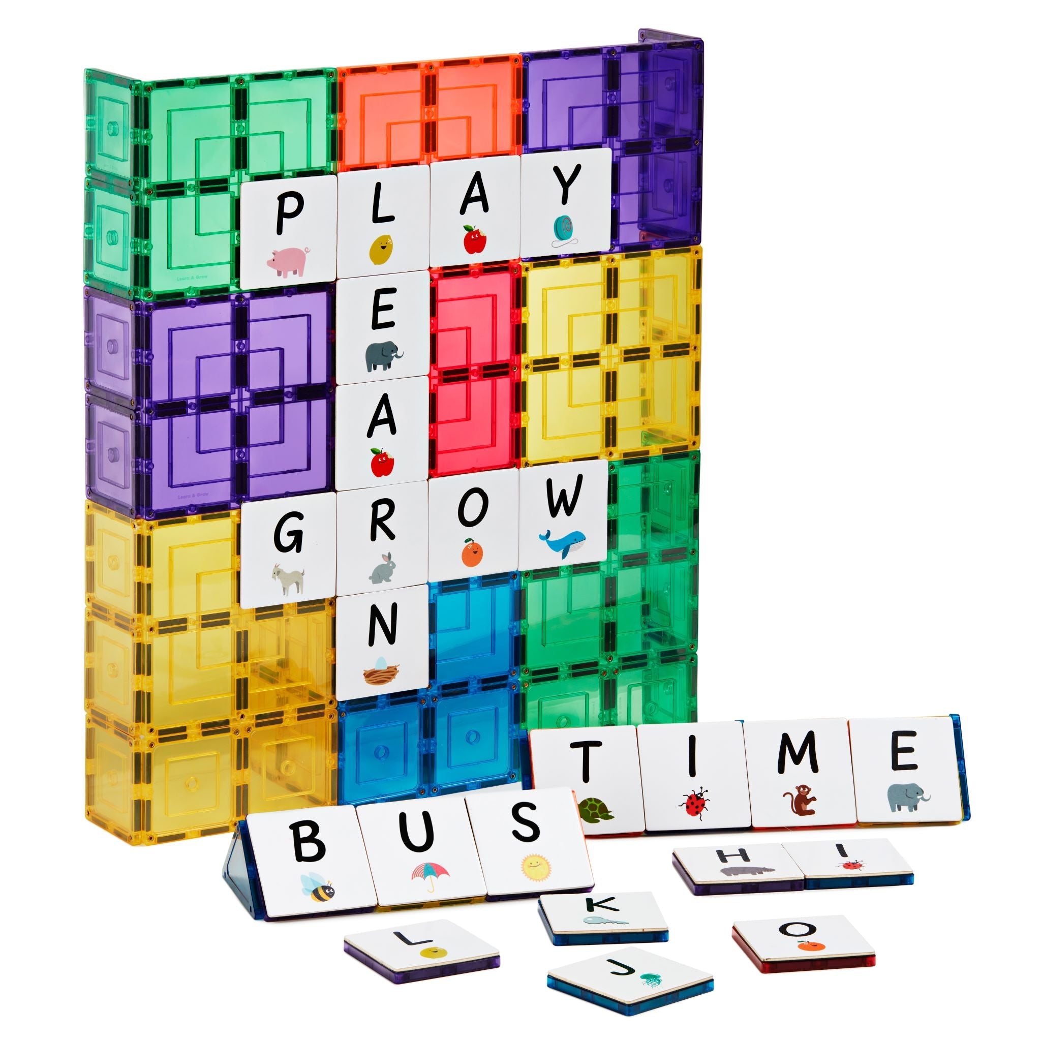 Play, learn and grow spelled with upper case alphabet tile toppers
