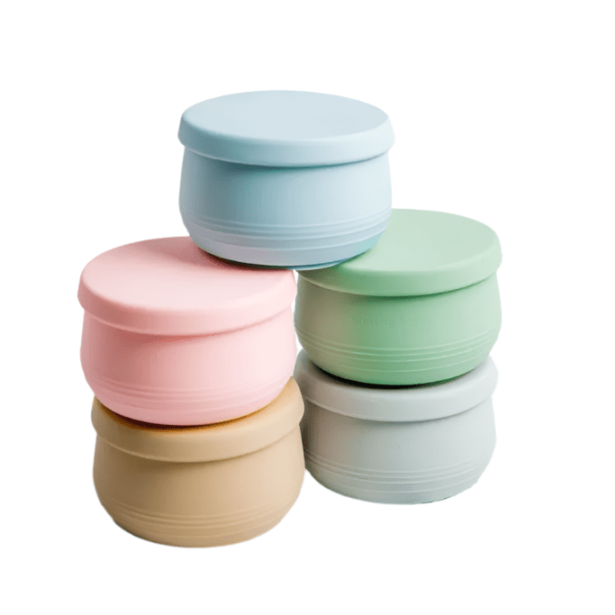 Suckie Scoop Mini Bowls stacked together in a range of colours