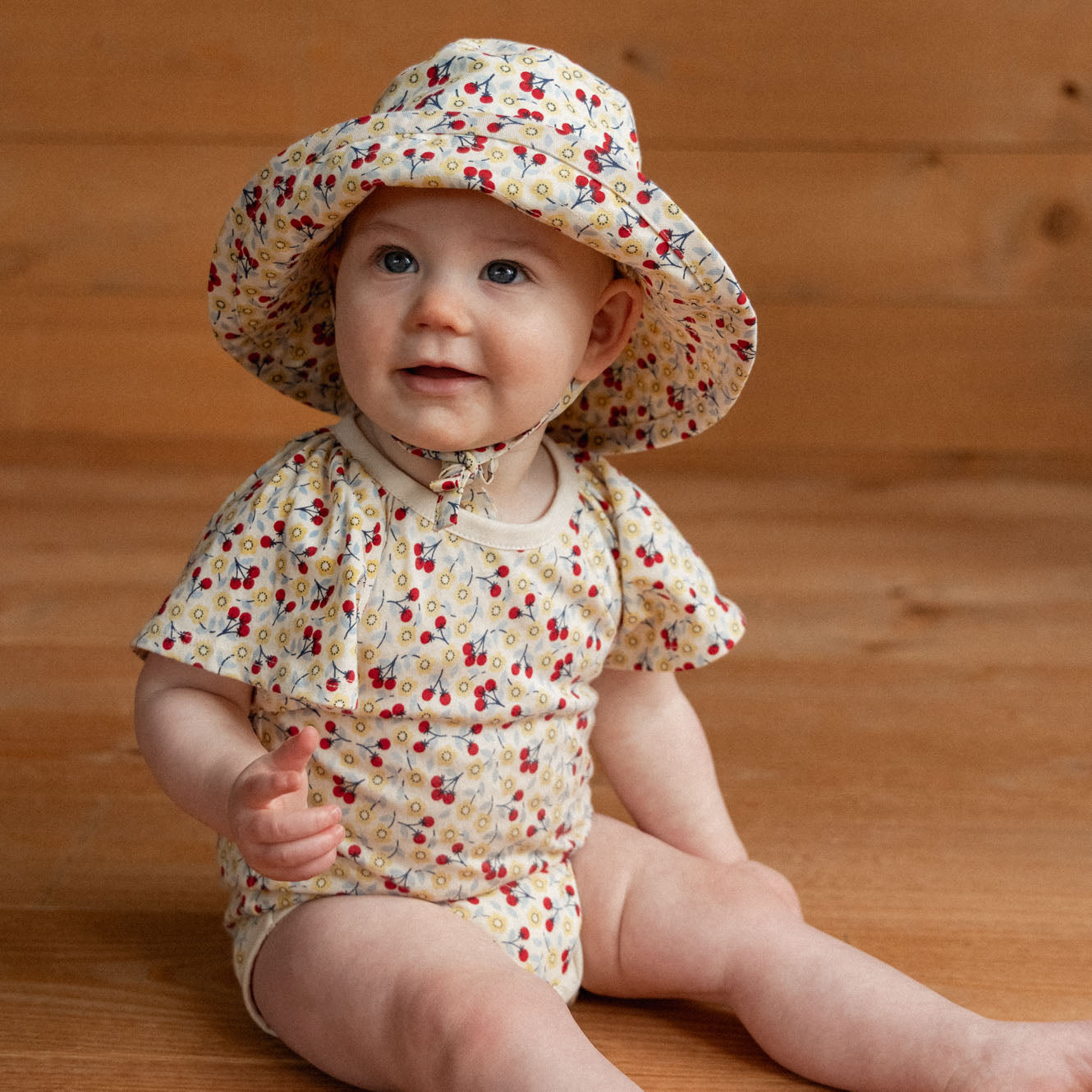Faye Bodysuit in Kitchen Garden Print, worn