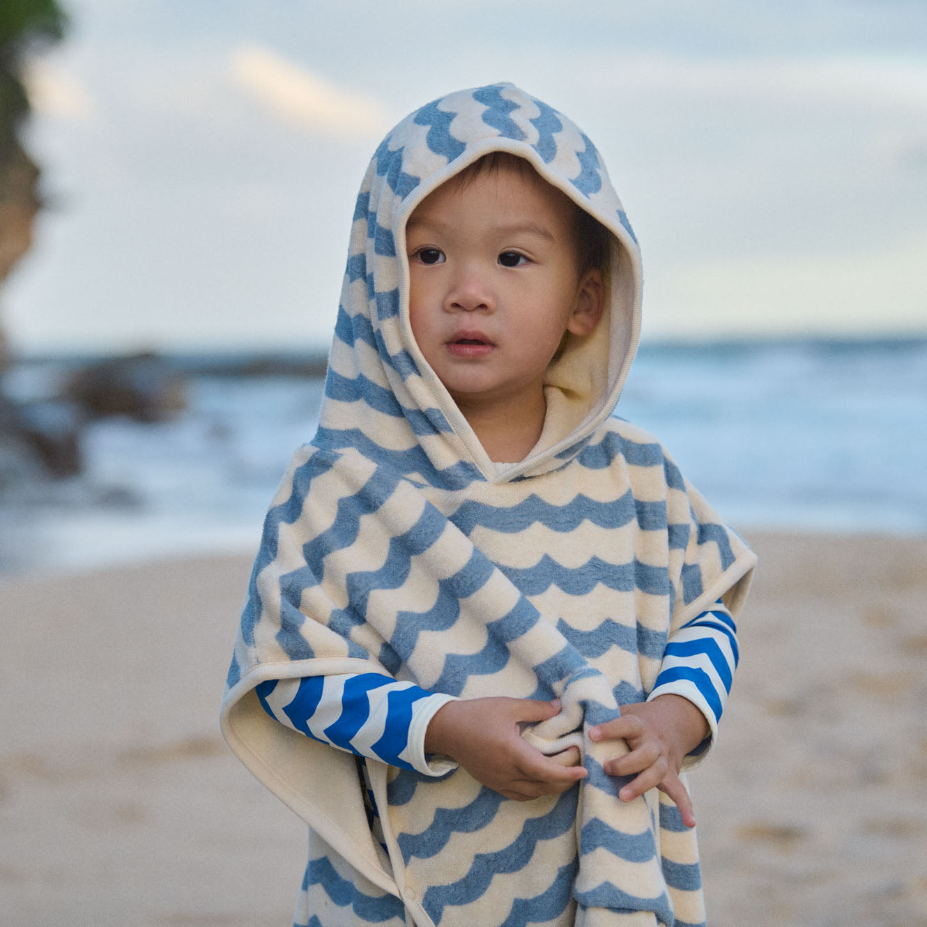 Poncho Towel in Waves Print, in use