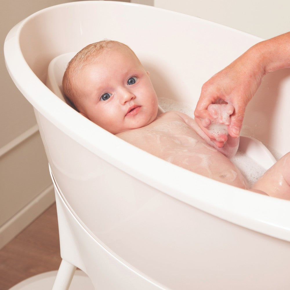 Luma Baby Bath Stand in White, side view
