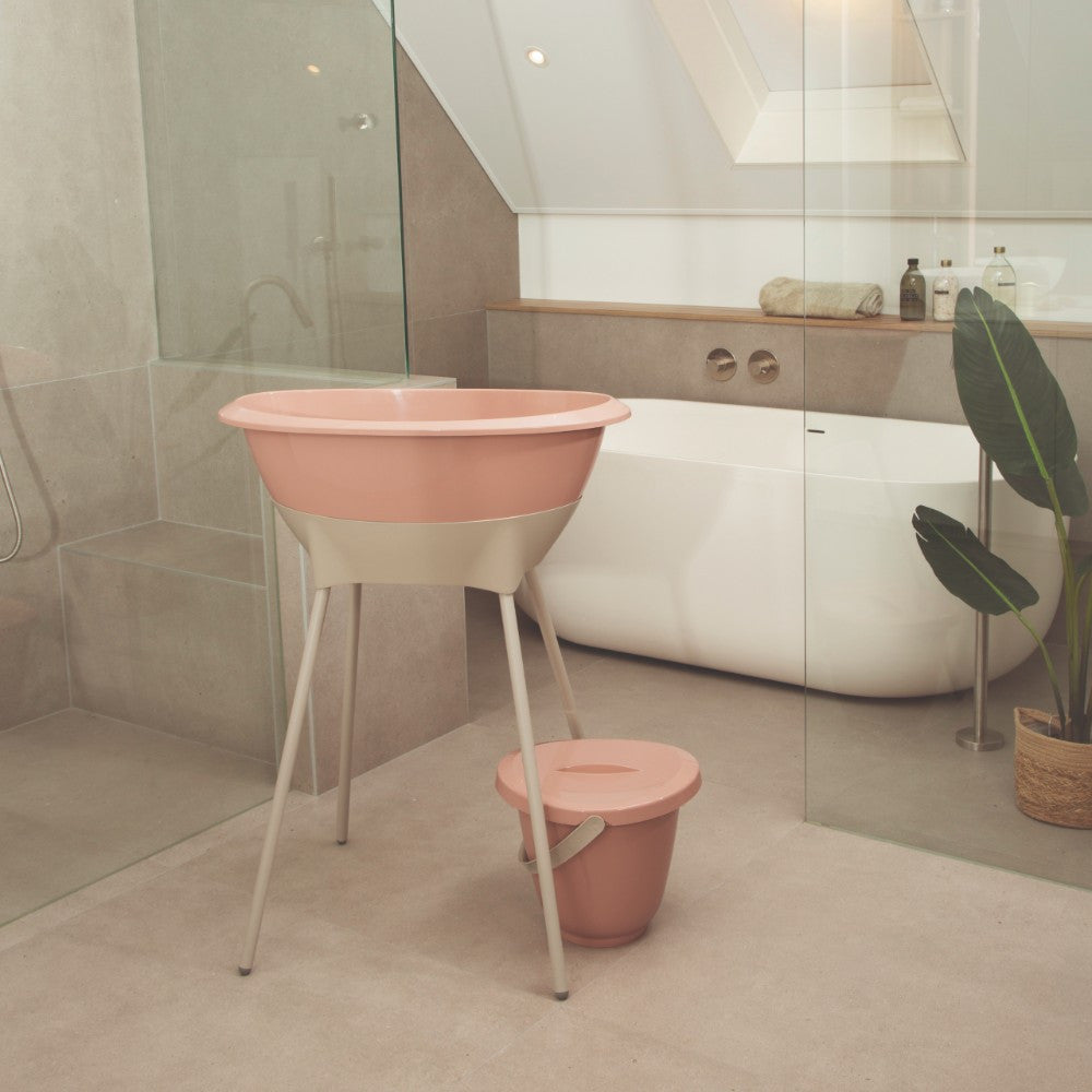 Luma Baby Bath Stand in Almond, side view
