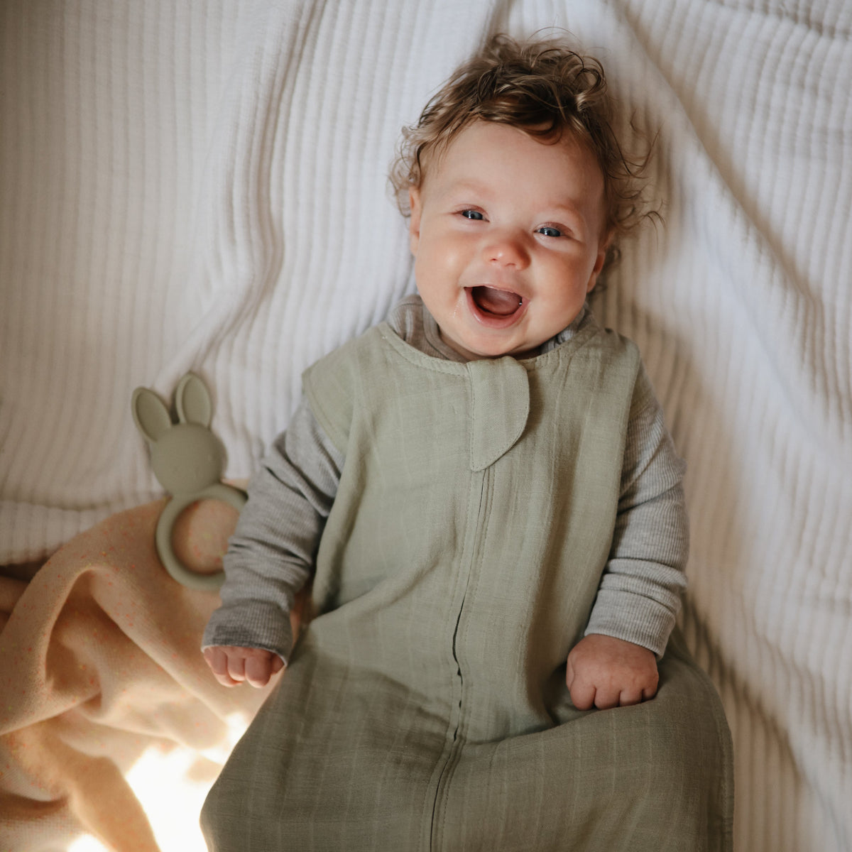 Baby with the Mushie Bunny Teether
