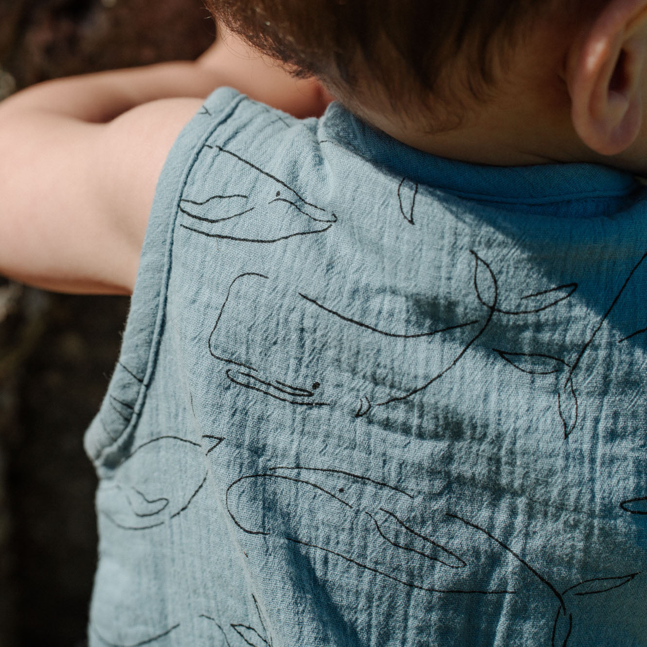 Nature baby blue whale cedar muslin suit