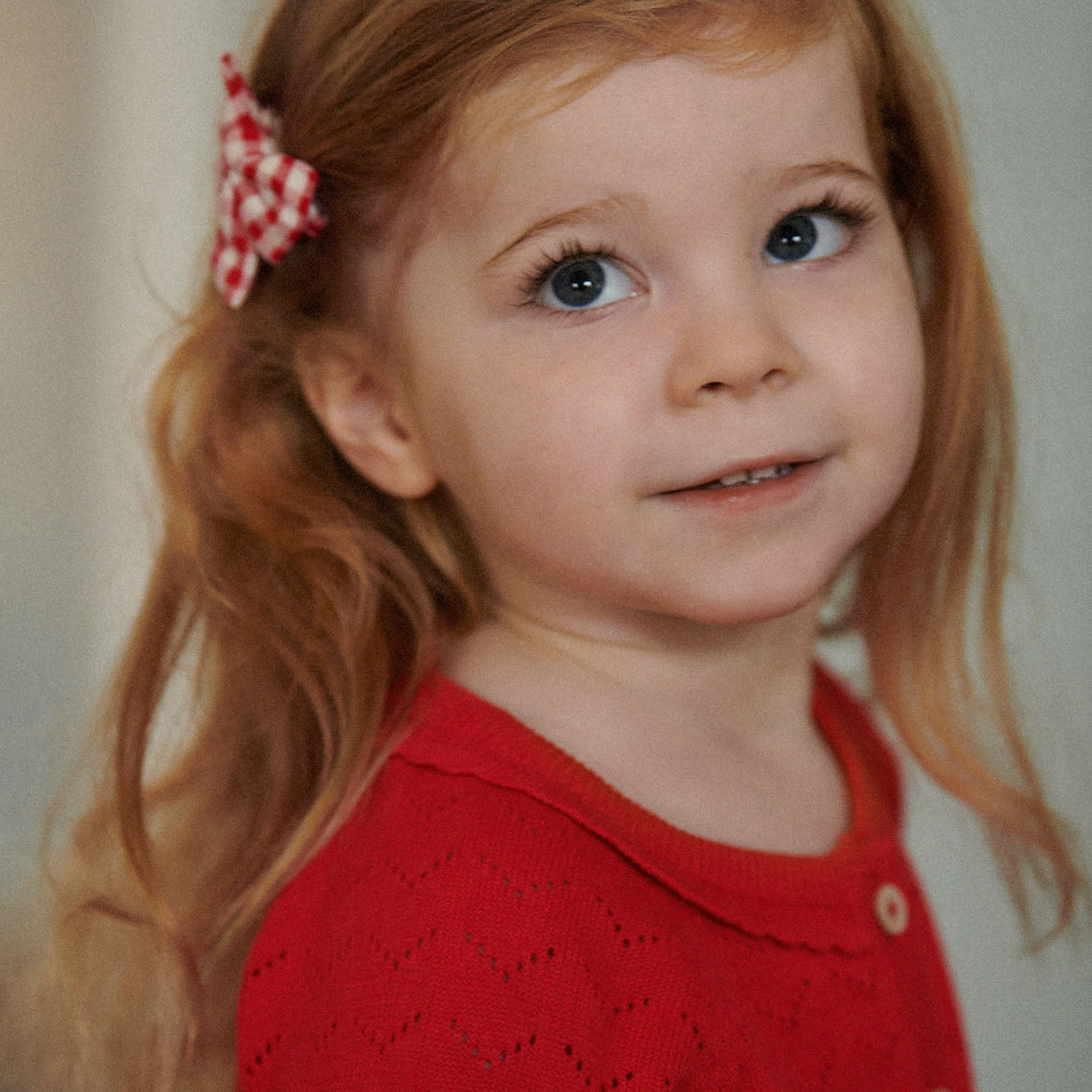Piper Cardigan in Raspberry Red Pointelle detail