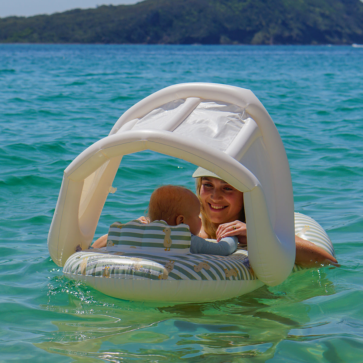 Sunnylife Float Together Baby Seat in use at the pool