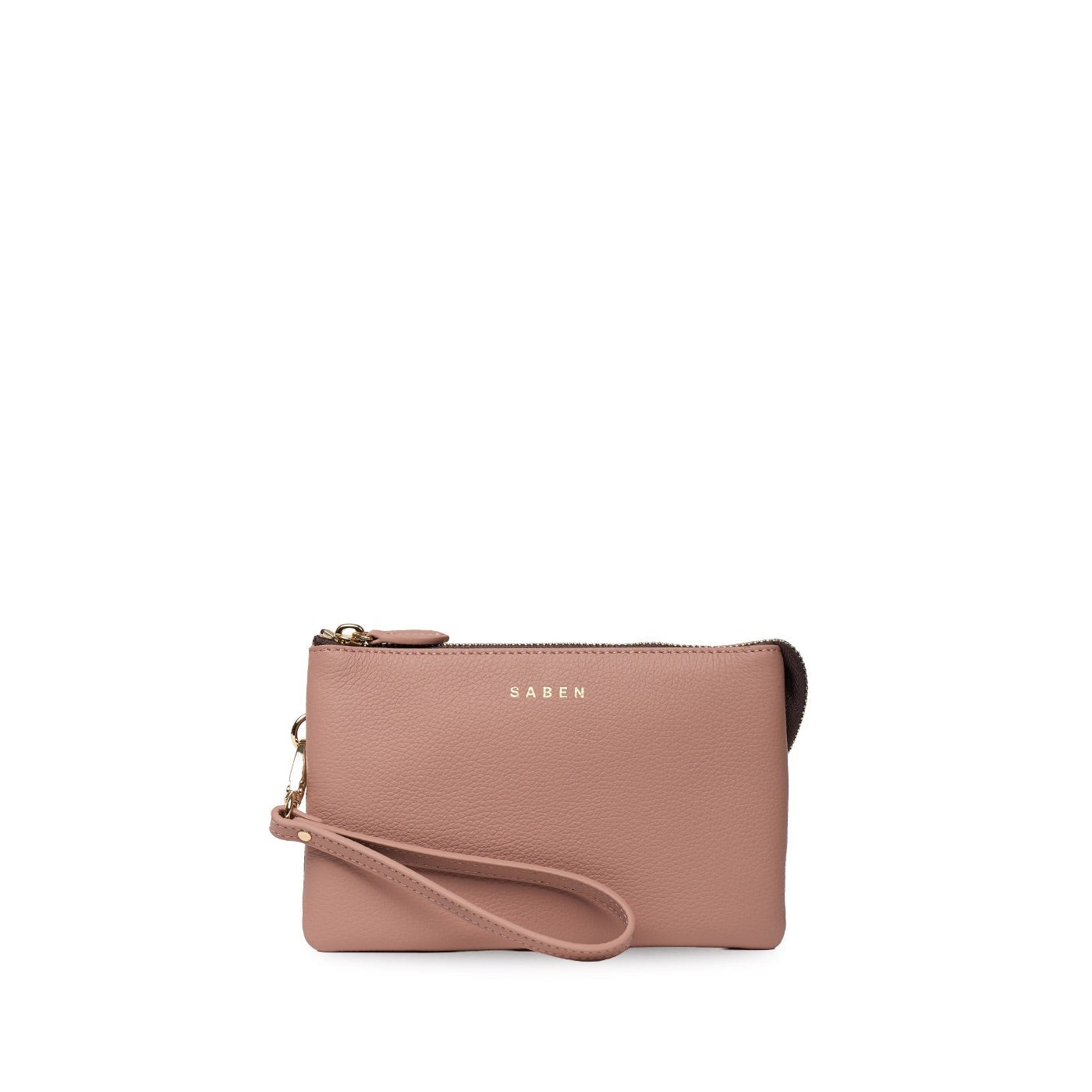 A dusty pink leather wristlet clutch with a matching wrist strap and gold-tone hardware, featuring the KAWS logo on the front, set against a plain white background.