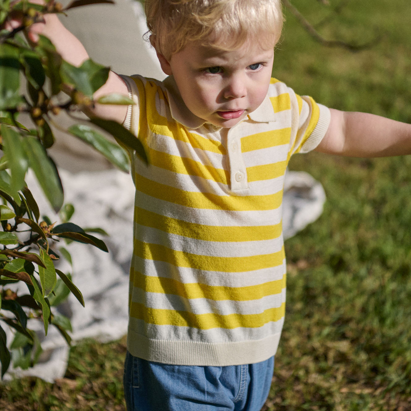Stevie Polo in Sunny Bold Stripe worn by child