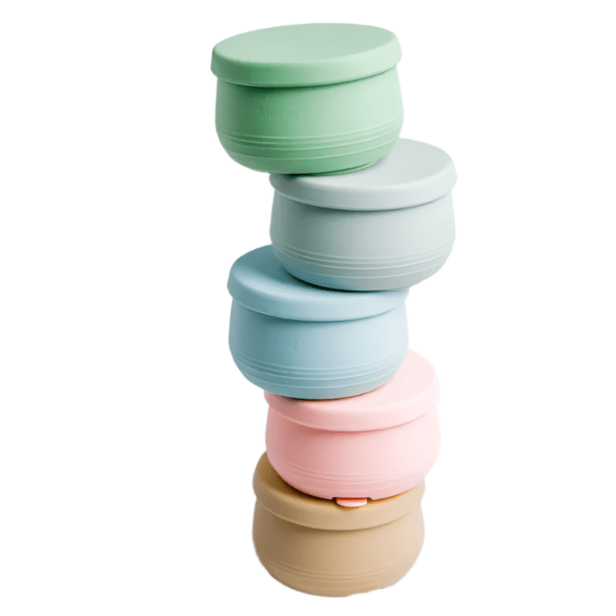 Suckie Scoop Mini Bowls stacked with lids on, ready for the freezer