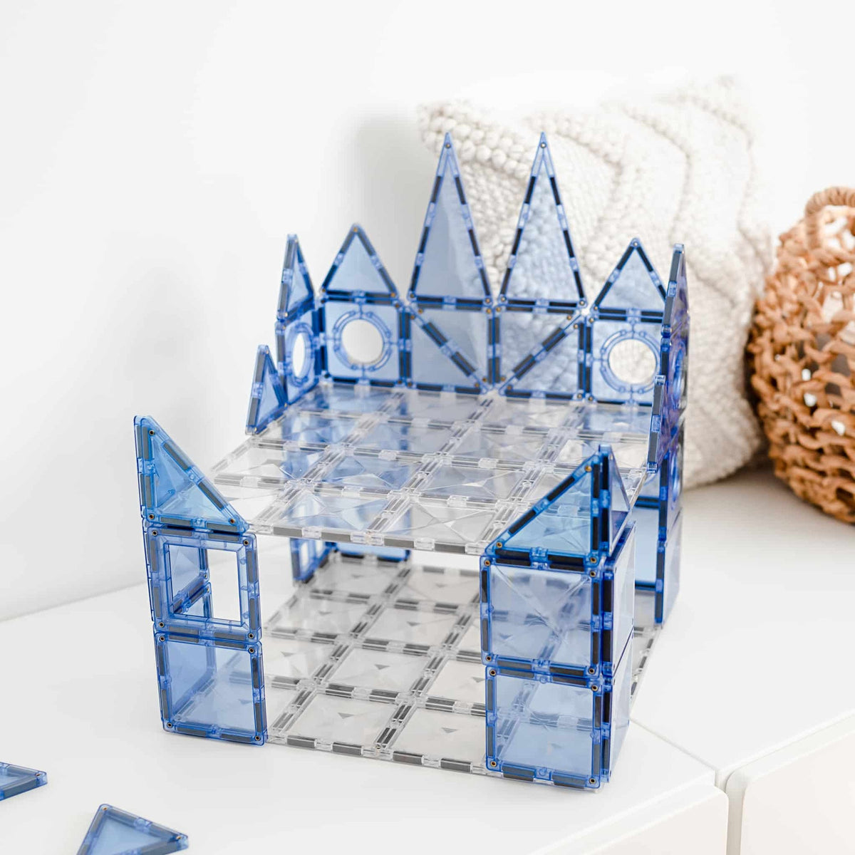 Clear Connetix base plate under a blue tile castle