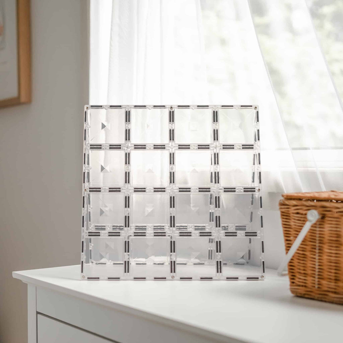 Two clear Connetix base plates joined together