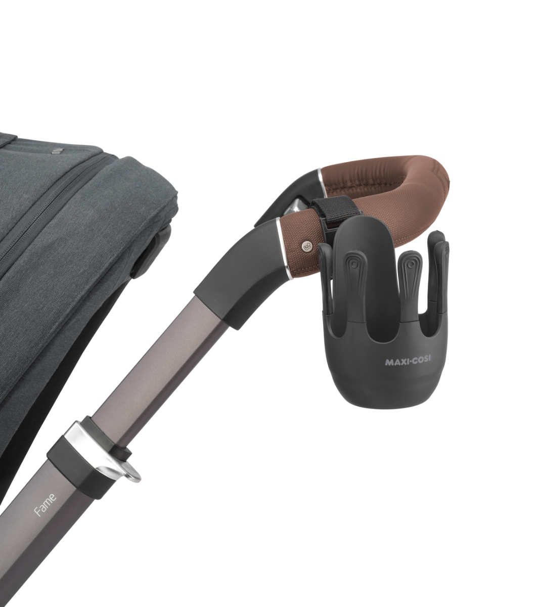 Maxi Cosi Cup Holder attached to a stroller frame