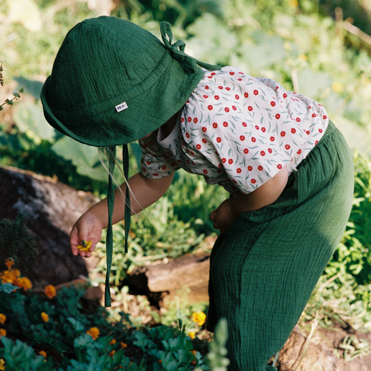 Muslin Sunhat in Fir Green worn by child