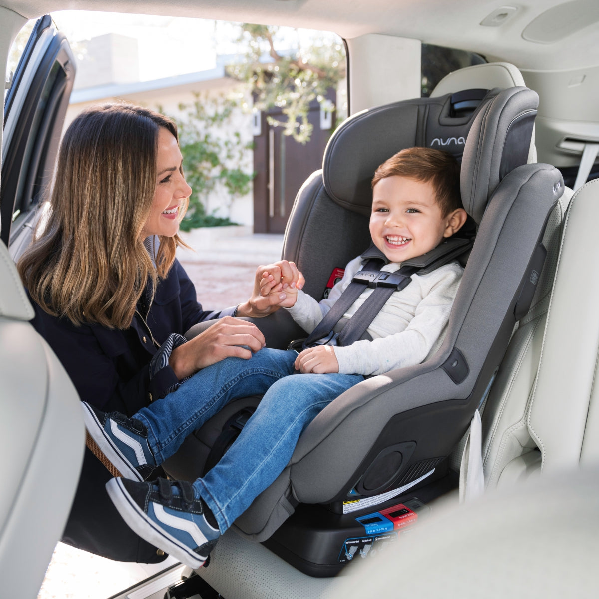 Nuna RAVA car seat lifestyle shot installed in a vehicle