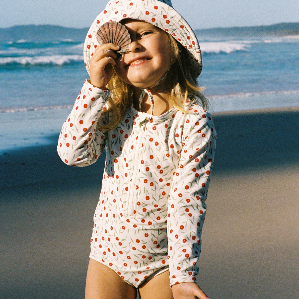 One Piece Bathing Swimsuit in Joiette Print worn at the beach