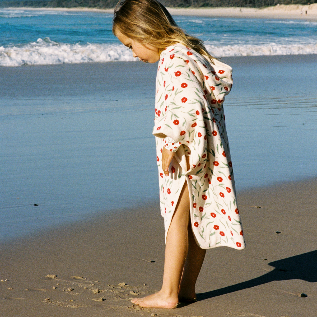 Poncho Towel in Joiette Print worn at the beach