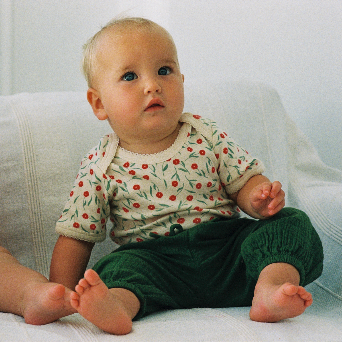 Short Sleeve Bodysuit in Joiette Print worn by baby