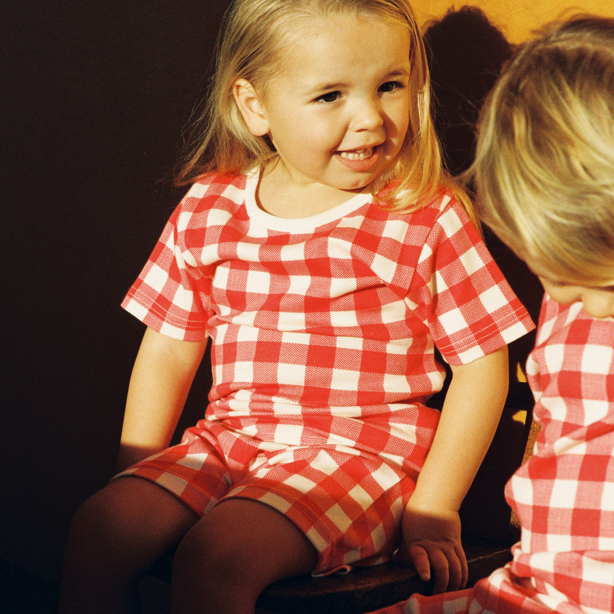 Shortie Pyjama Set in Red Crispin Check worn by child