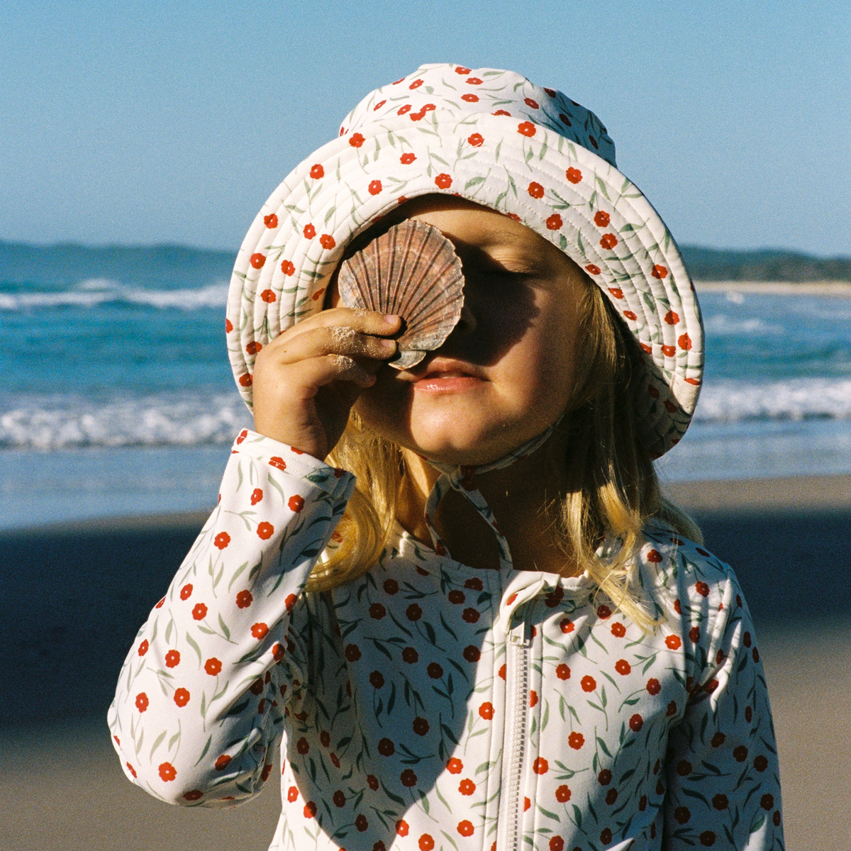 Splash Sunhat in Joiette Print worn at the beach